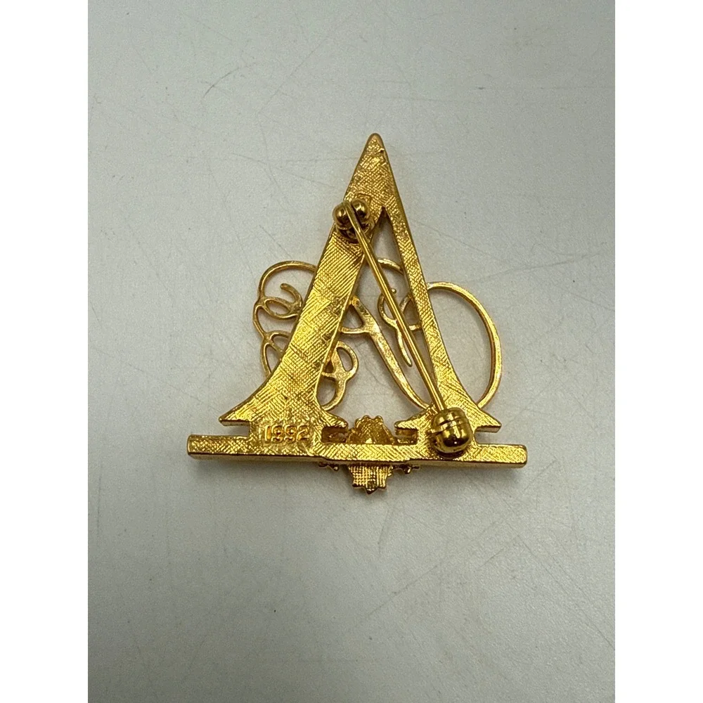 Vintage 1992 Gold Tone Initial‎ Triangle Brooch Rhinestone Script Pin 1.5 Inch
